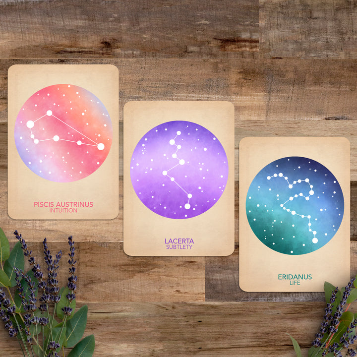 three card faces from the deck on a wooden background